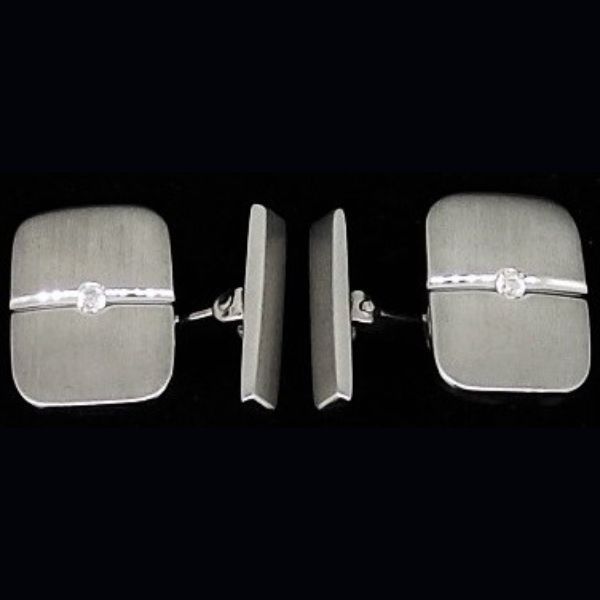 Gemelos en oro blanco mate con circonitas
