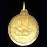 Medalla redonda en oro amarillo del niño Jesús