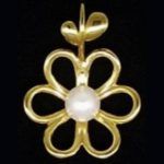 Colgante con forma de flor con perla blanca de Tous