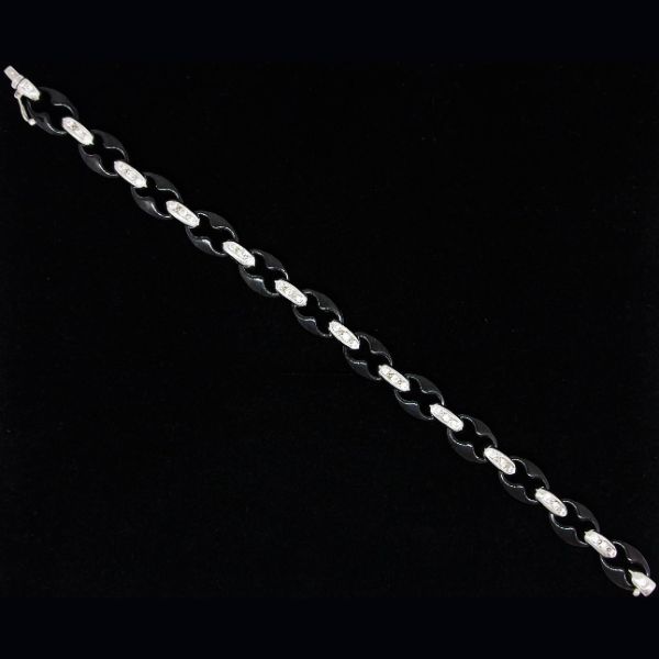 Pulsera de eslabones en oro blanco con brillantes y eslabones de ceramica