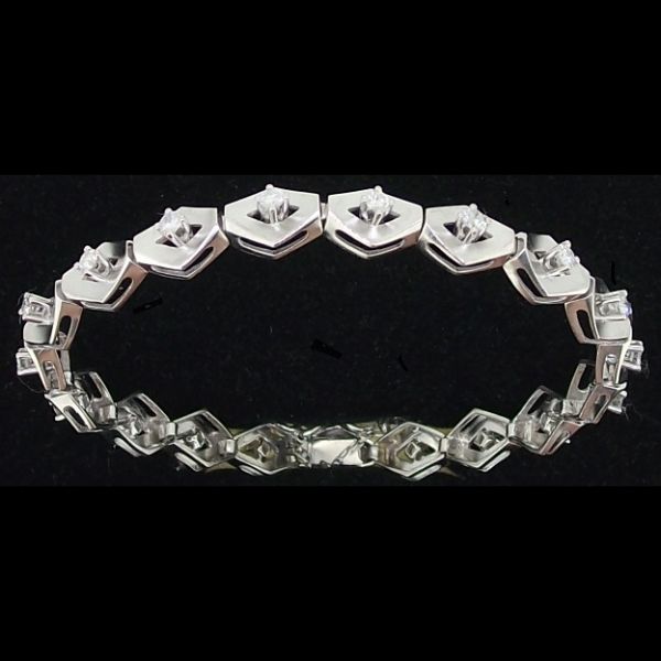 Pulsera en oro blanco con 19 brillantes