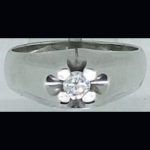 Solitario en oro blanco con brillante talla diamante engastado en garra