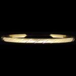 Pulsera cerrada en oro amarillo con labrado de rayas oblicuas