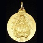 Medalla de tamaño medio en oro amarillo del cristo del Medinaceli