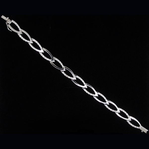 Pulsera de eslabones con terminaciones en pico en oro blanco y circonitas
