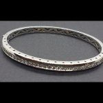 Pulsera rigida oro blanco con circonitas