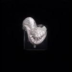 Anillo oro blanco con circonitas forma ola