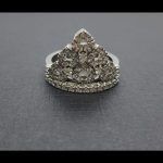 Anillo oro blanco forma corona con puntas de brillantes