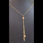 Cadena oro amarillo con colgante de bolas