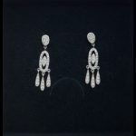 Pendientes oro blanco semilargos con circonitas