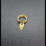 Anillo de 4 aros oro amarillo "Tous"con colgante en forma hoja