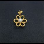 Colgante oro amarillo "Tous" forma flor con perla blanca