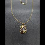 Cadena oro amarillo "Tous" con colgante forma oso con piedras azules