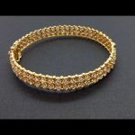 Pulsera oro amarillo cuajada de circonitas