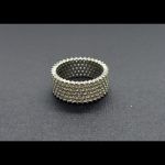 Anillo oro blanco cuajado de circonitas