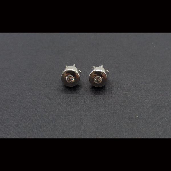 Pendientes oro blanco con brillante de 0,08 qtes cada uno