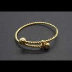 Pulsera niña torneada forma tonisa con bolas