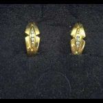 Pendientes oro amarillo con 5 brillantes de 0,03 qt, 0,02 qt y 0,01 qt, total 0,09 qtes ,cierre "Omega"