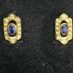 Pendientes oro amarillo con piedra central azul y circonitas blancas