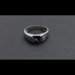 Anillo oro blanco con circonita lila