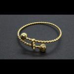 Pulsera torneada pequeña con bolas en oro amarillo