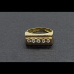 Anillo oro amarillo con circonitas blancas