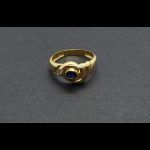 Anillo oro amarillo con piedra azul y circonitas blancas