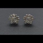 Pendientes oro blanco con motivos de hojas, flotes tipo Tous con cierre omega