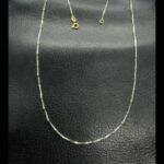 Cadena oro blanco 40 cm de 18k con bolltas en oro amarillo