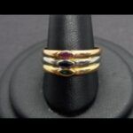 Anillo oro amarillo nº 17 de 18k  triple aro con circonitas de colores