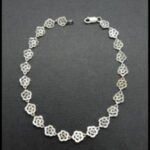 Pulsera oro blanco 18k con eslabones forma flor de 19 cm