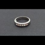 Anillo oro blanco 18k nº 15 con 7 brillantes engarzados en carril total 0,35 qt