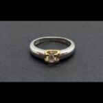 Anillo oro blanco 18k nº13 con brillante de 0,25 qt engarzado en oro amarillo