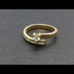 Anillo oro amarillo 18 kt con circonitas blancas, nº 20,5
