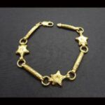 Pulsera oro amarillo 18 k con eslabones forma estrella con dibujos, 20 cm