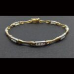 Pulsera oro amarillo y blanco 18k con circonitas 19 cm