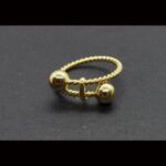 Anillo oro amarillo 18k con forma torneada con bolas de oro nº 23