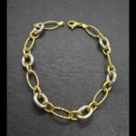 Pulsera oro amarillo y blanco de 18k(20 cm)