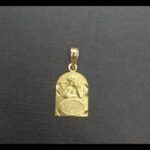 Medalla oro amarillo 18k del Angel con reloj