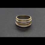 Anillo oro amarillo y blanco de 18k con forma de aros nº 17,5