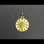 Medalla oro amarillo 18k con imagen del signo del zodiaco Libra