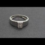 Anillo oro blanco 18k nº 13 con circonitas blancas