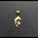 Colgante oro amarillo 18k forma delfín con estrella
