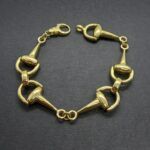 Pulsera oro amarillo 18k eslabones forma estribo(20 cm)