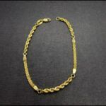 Pulsera oro amarillo 18k con eslabón tipo cordón y plano 19,5 cm