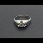 Solitario oro blanco 18k nº 21 con brillante central de 0,25 qtes