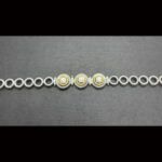 Pulsera oro blanco 18k decorado en los eslabones del centro con puntas de brillantes amarillos y blancos  18 cm