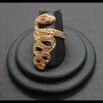 Anillo oro amarillo 18k con forma de serpiente con circonitas corintas en los ojos nº 17