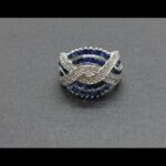 Anillo oro blanco 18k con puntas de brillantes y piedras azules nº 17