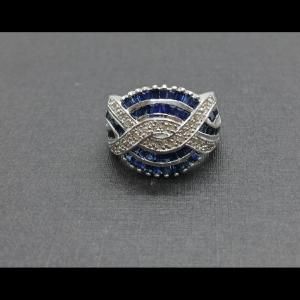 Anillo oro blanco 18k con puntas de brillantes y piedras azules nº 17